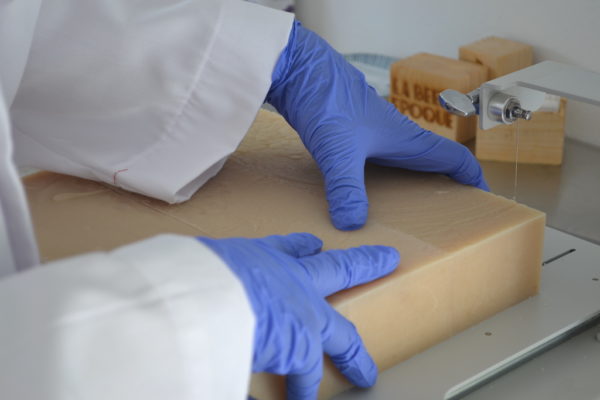 Cutting soap slab in the workshop